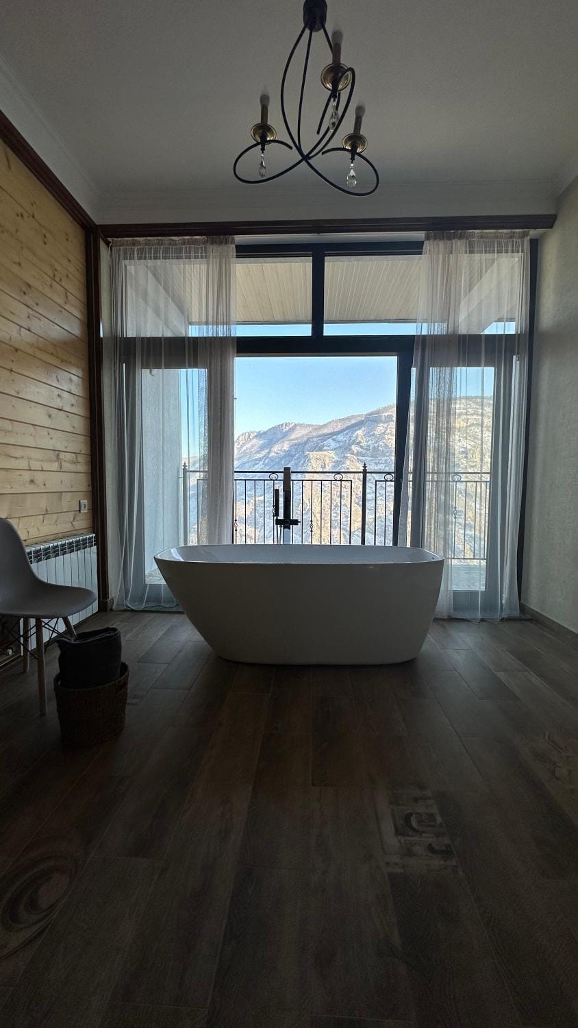 Balcony/Terrace, Living room, Seating area, Mountain view, Bath