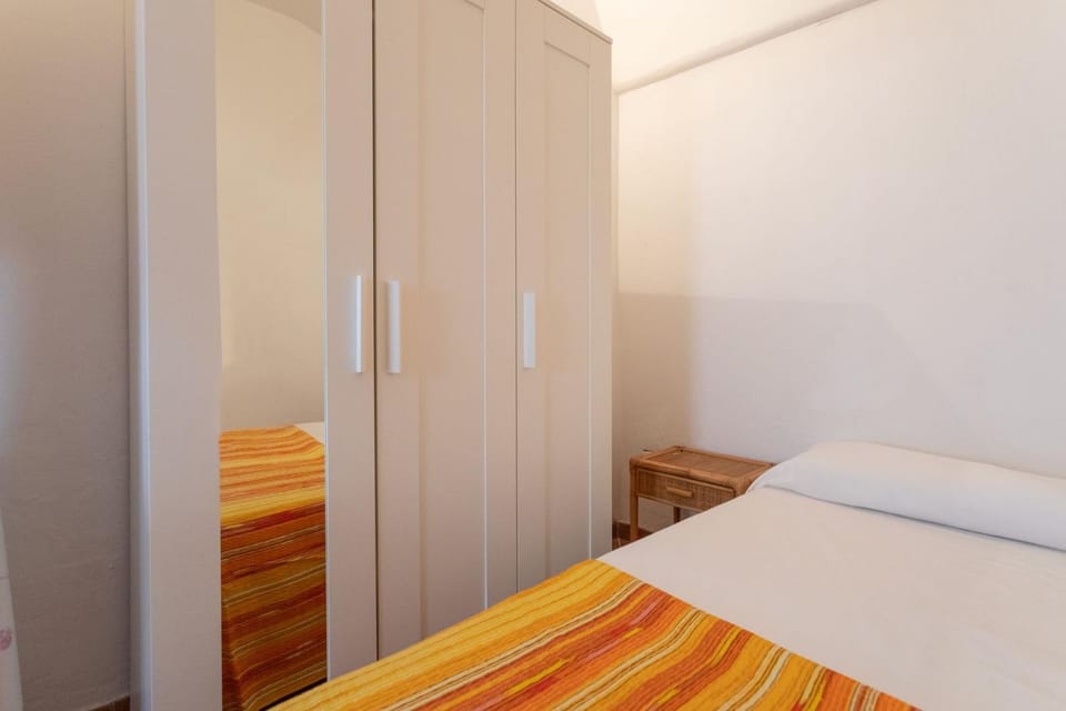 Bed, wardrobe