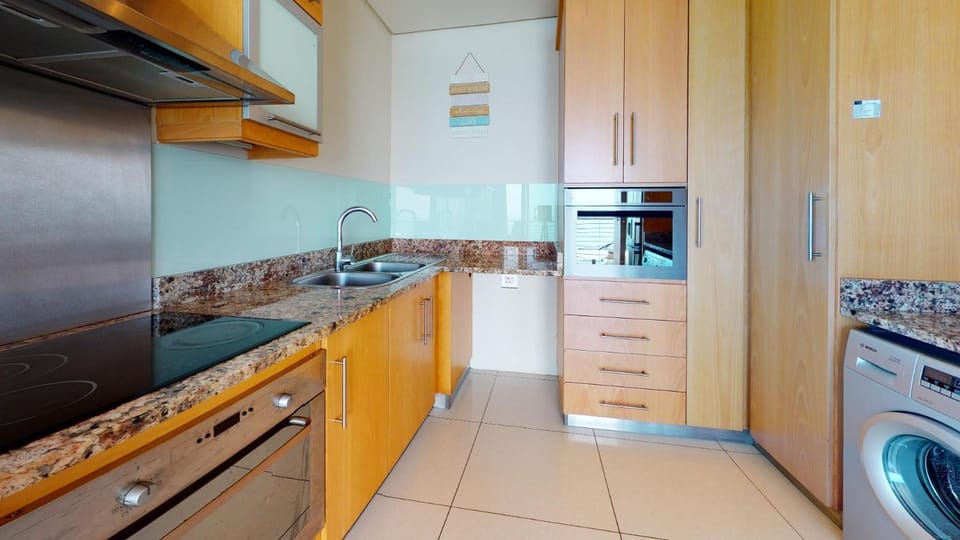 minibar, stove, washing machine, dryer