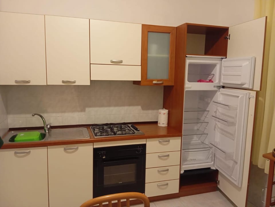 Kitchen or kitchenette, oven, stove
