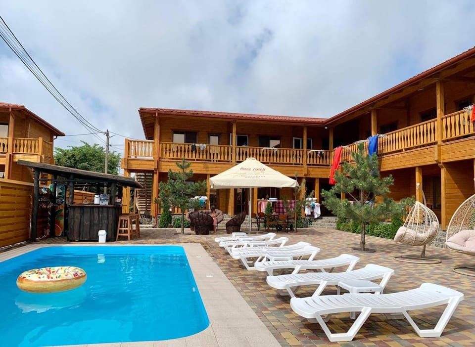 Property building, Communal lounge/ TV room, Swimming pool