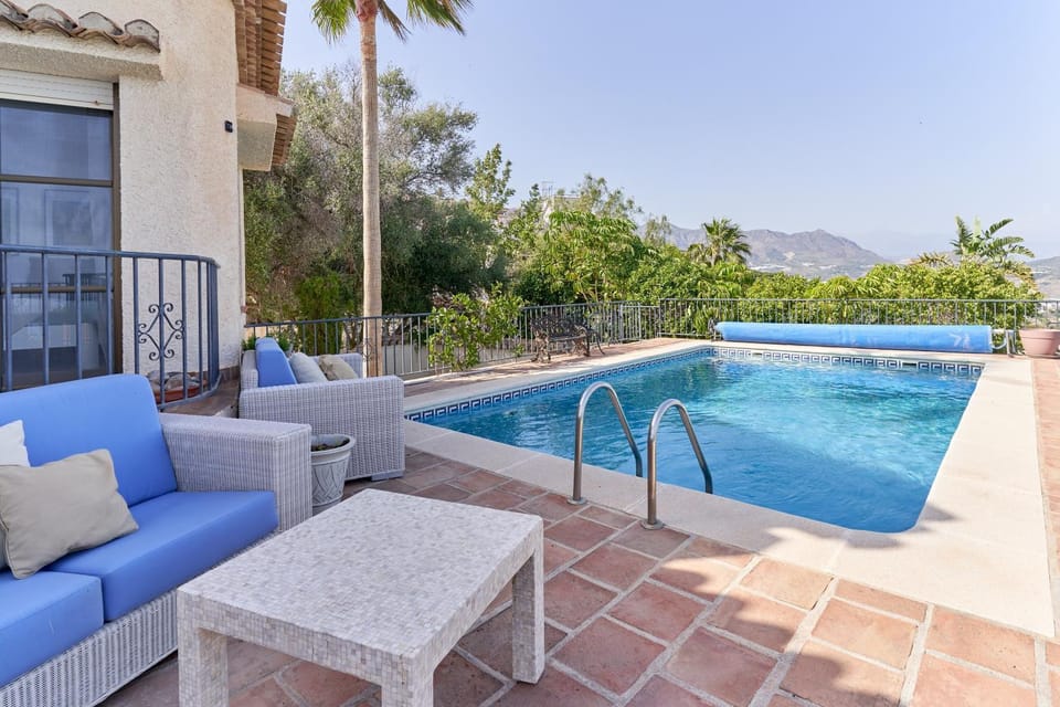 Property building, Living room, Swimming pool