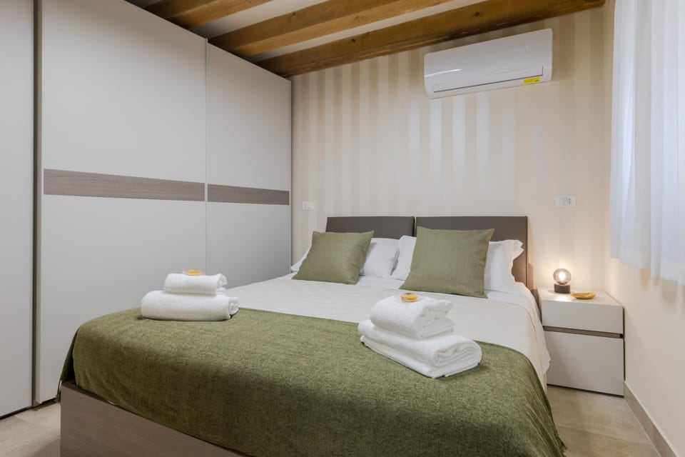 Bed, Photo of the whole room, Bedroom, towels, wardrobe, air conditioner