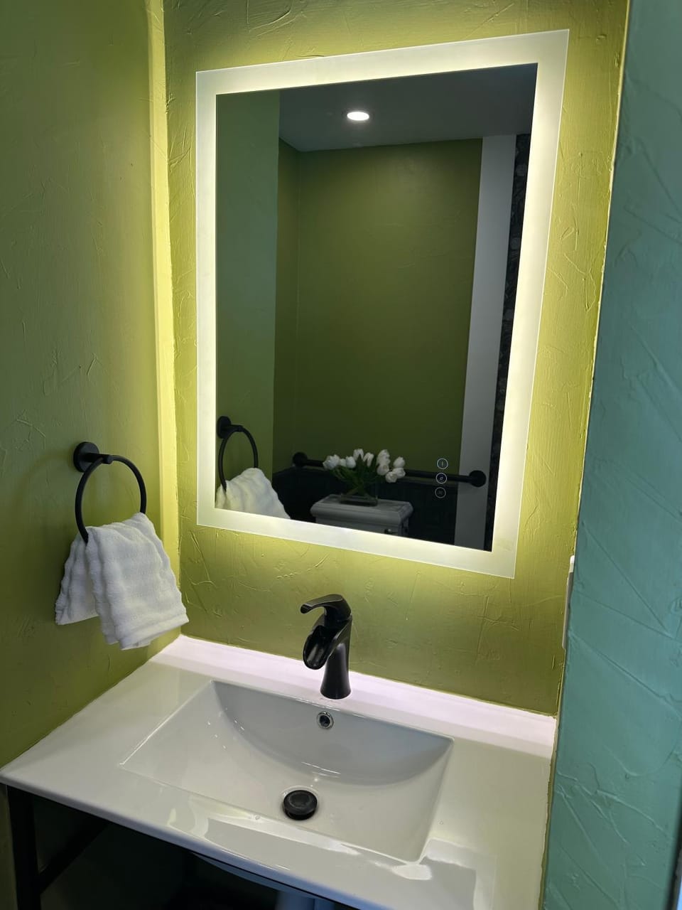 Bathroom, bidet, hair dryier, air conditioner