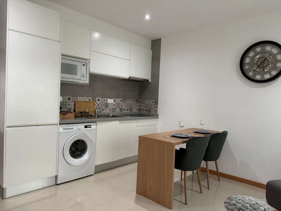Kitchen or kitchenette, Living room, Dining area, stove, washing machine