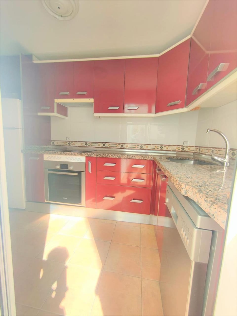Kitchen or kitchenette, oven, stove