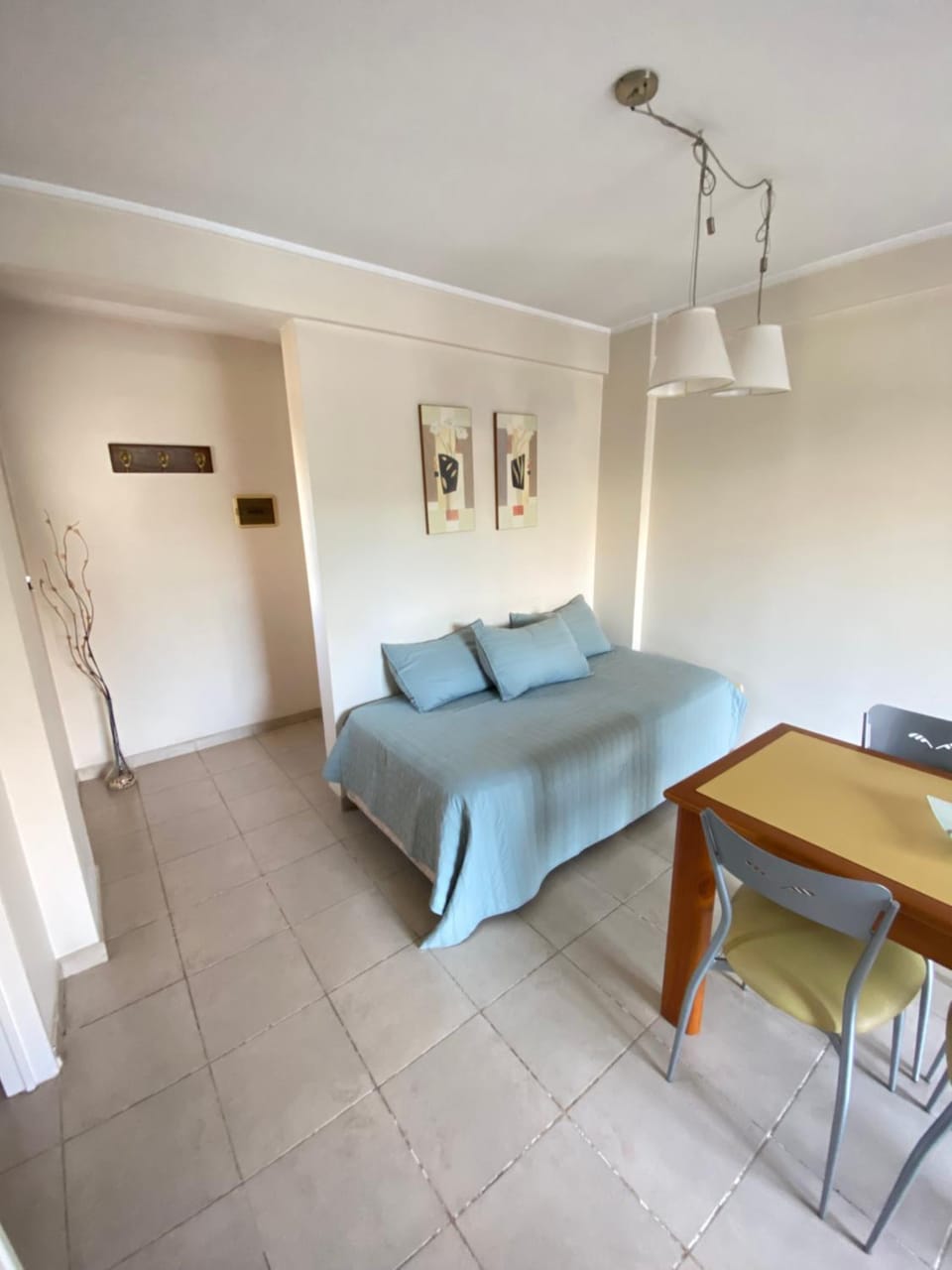 Bed, Living room, Seating area, Dining area