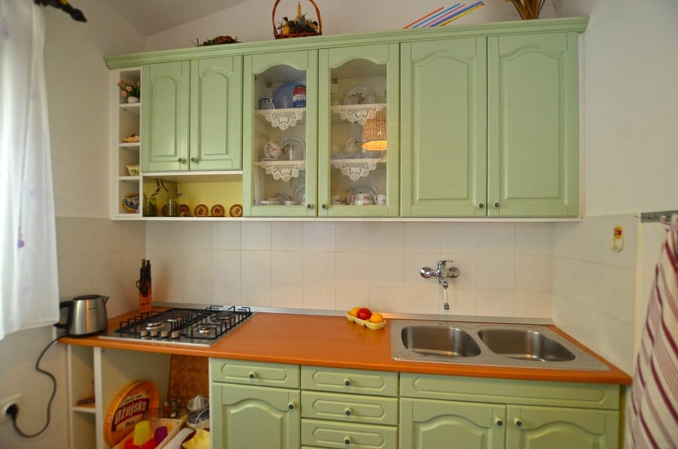 Kitchen or kitchenette, stove
