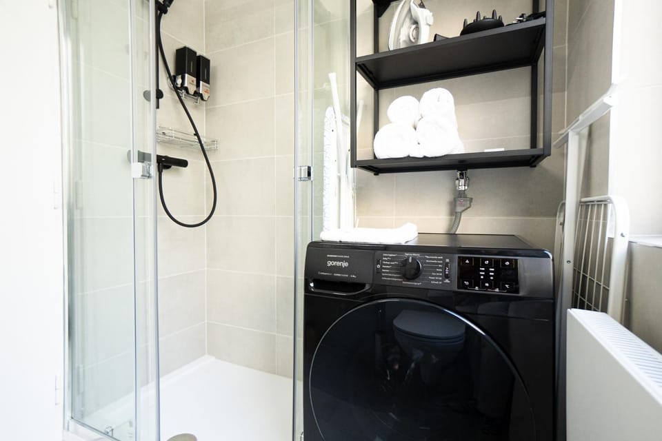 Shower, Bathroom, towels, washing machine, dryer