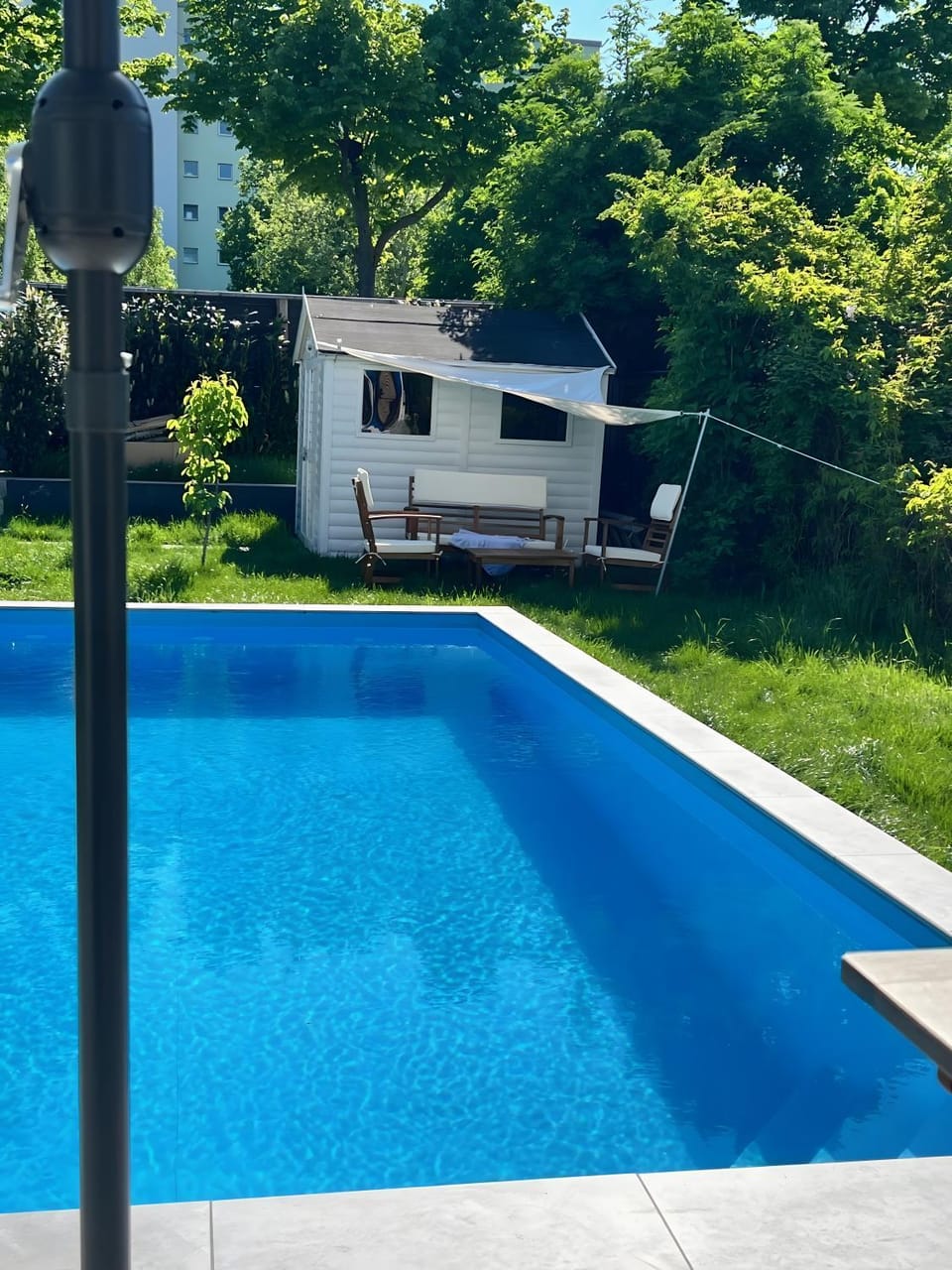 Property building, Living room, Swimming pool