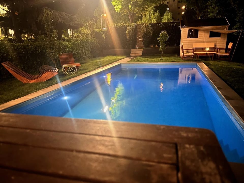 Property building, Living room, Swimming pool