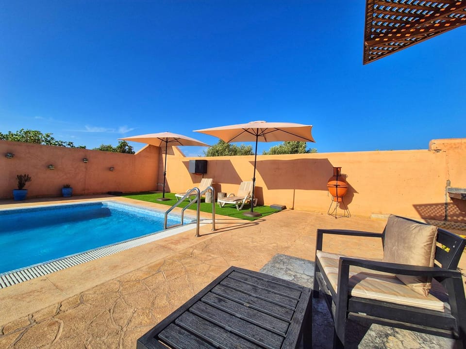 Patio, Day, Pool view, Swimming pool, sunbed