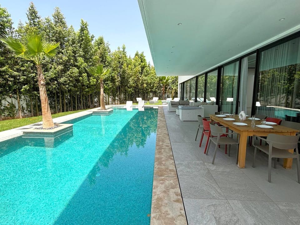 Patio, Day, Pool view, Swimming pool, sunbed