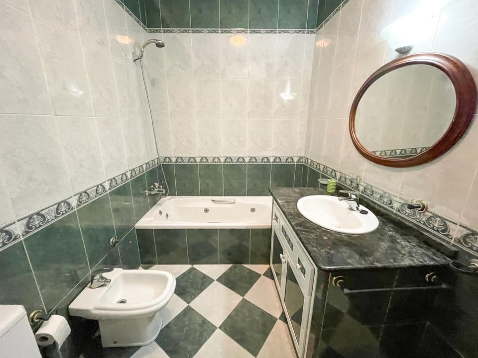 Kitchen or kitchenette, microwave, oven, washing machine