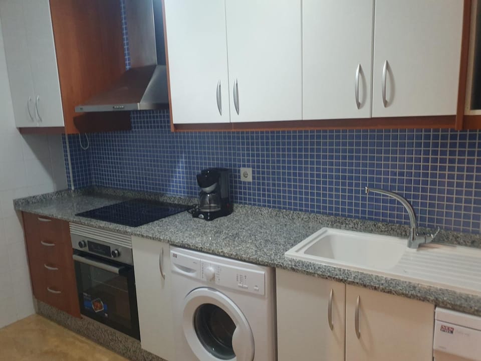 Kitchen or kitchenette, dishwasher, washing machine