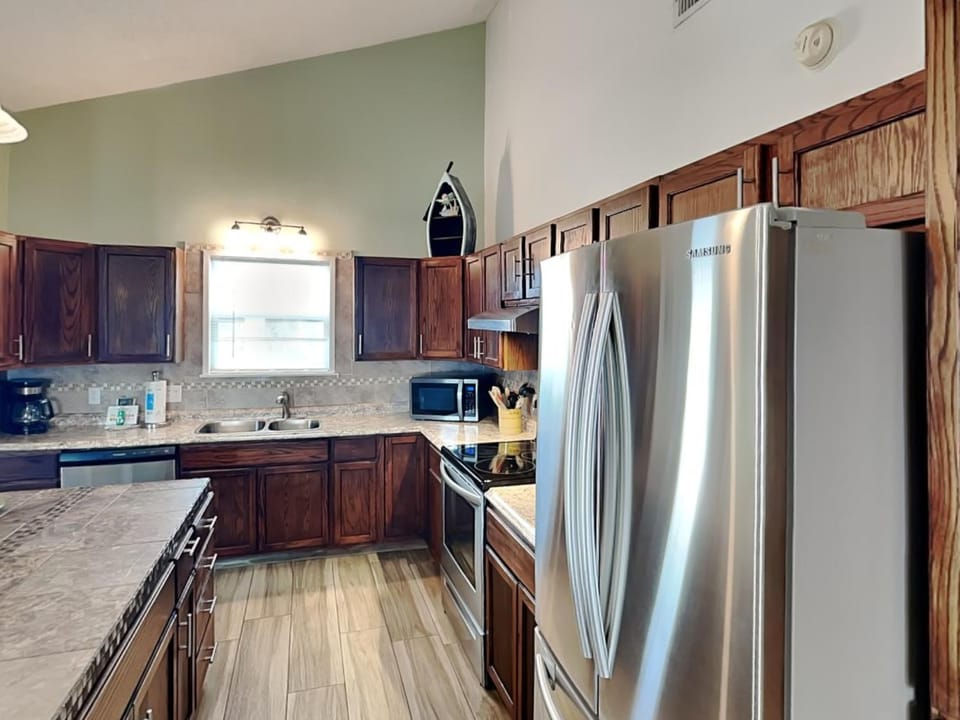 Kitchen or kitchenette, microwave, oven, stove, kitchen