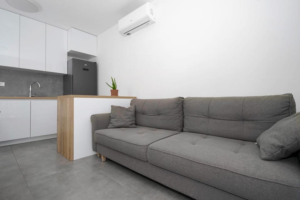 Kitchen or kitchenette, Living room, Seating area, air conditioner