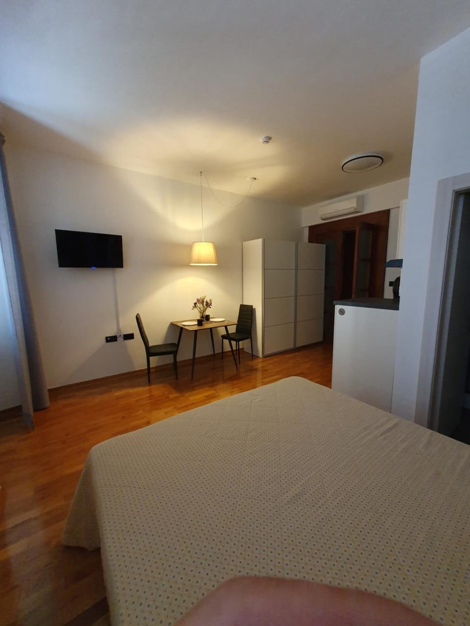Communal lounge/ TV room, Bed, TV and multimedia, Living room, Photo of the whole room, Seating area, Bedroom, hair dresser, wardrobe, air conditioner