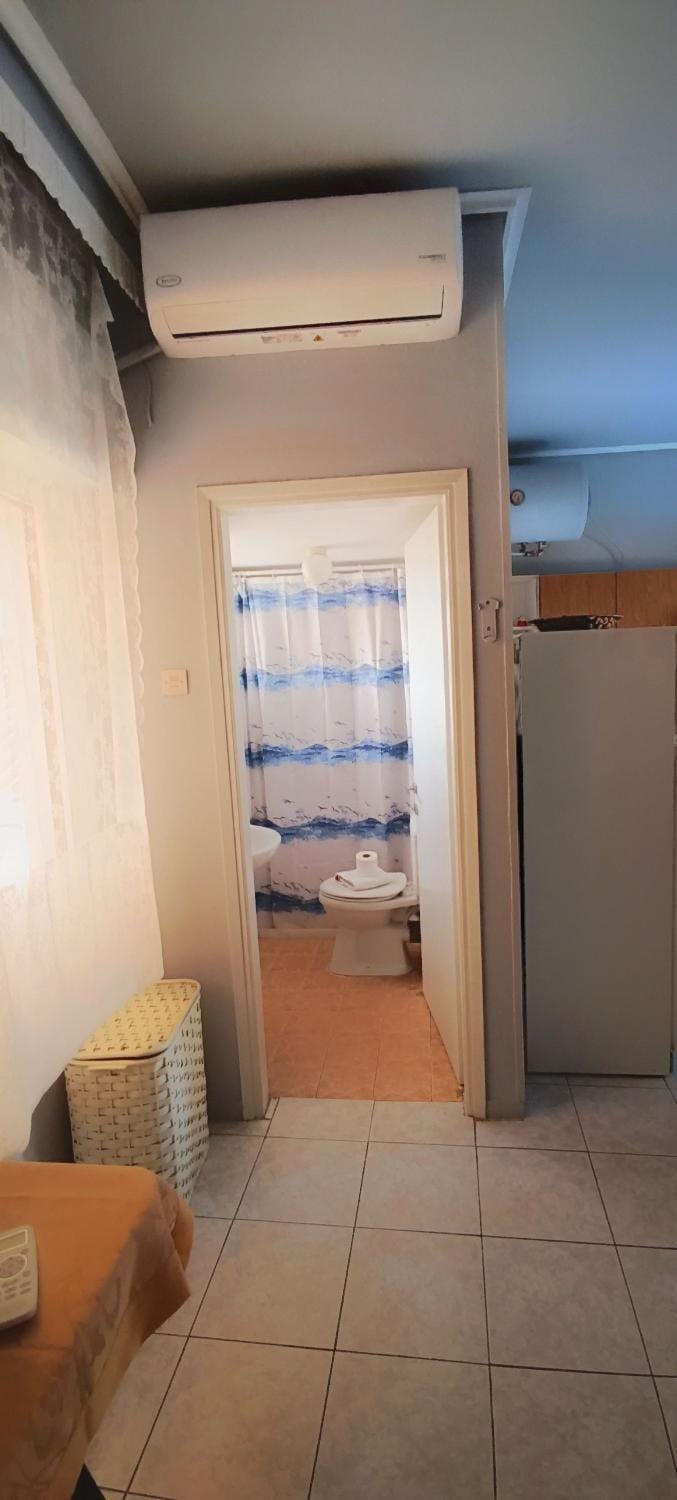 Bathroom, towels, air conditioner
