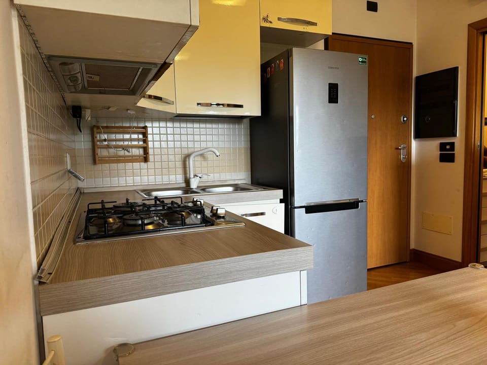 Kitchen or kitchenette, stove
