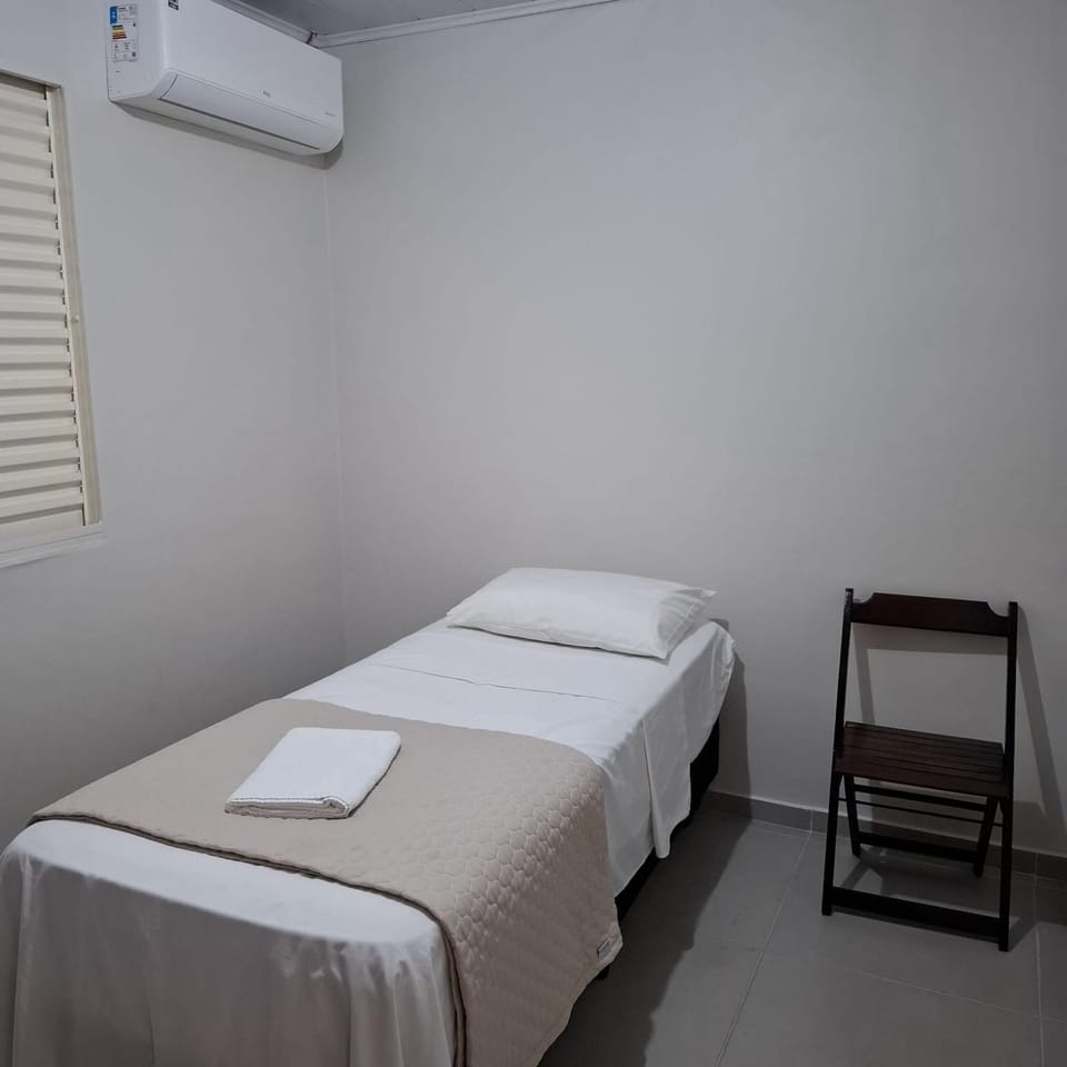 Bed, air conditioner