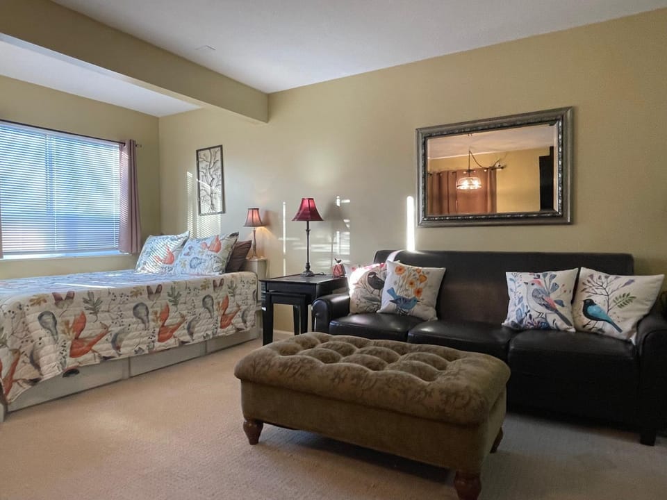 Bed, Living room, Seating area, Bedroom