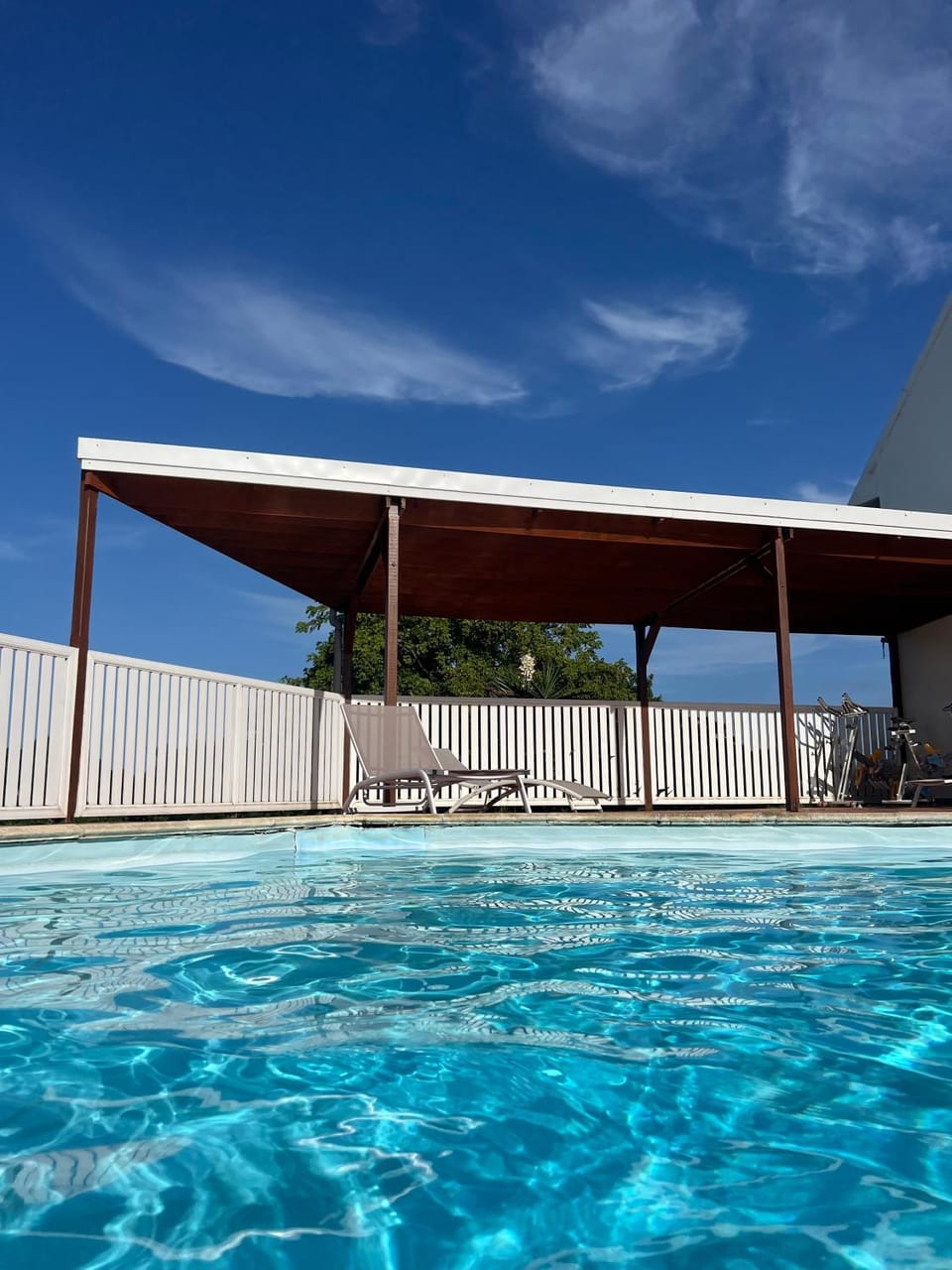 Swimming pool, sunbed