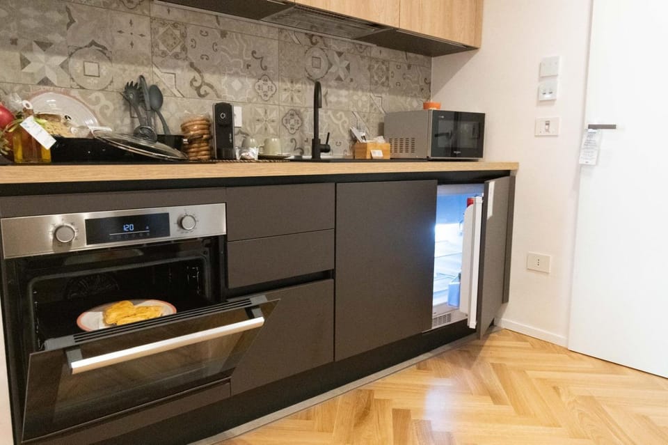 Kitchen or kitchenette, oven, stove