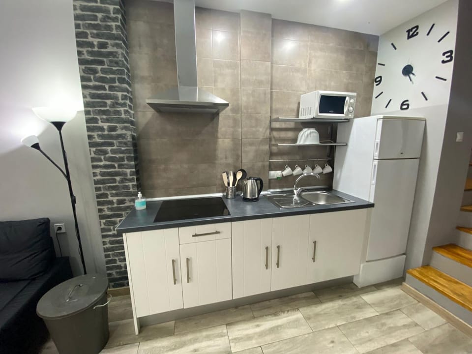 Kitchen or kitchenette, stove