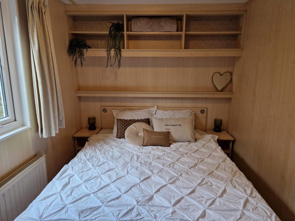 6 persoons chalet op de Veluwe bij binnen en buiten zwembad Chalet in Arnhem