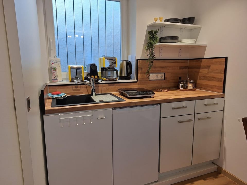 Kitchen or kitchenette, stove