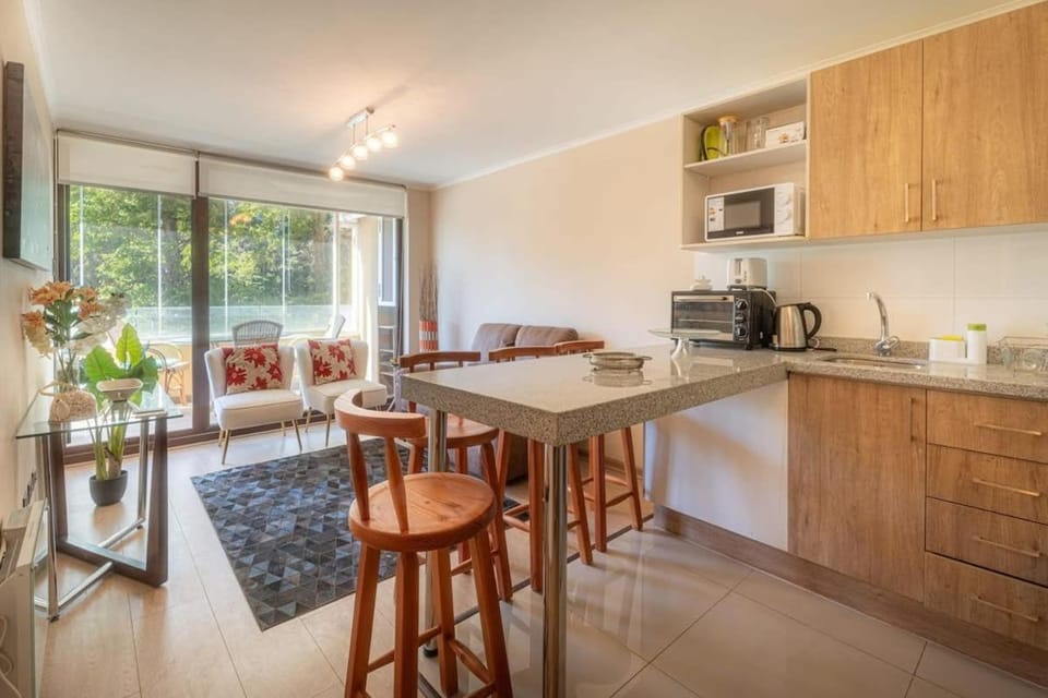Kitchen or kitchenette, Living room, Seating area, Dining area