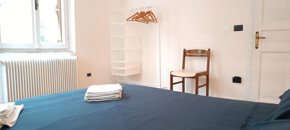 Bed, Photo of the whole room, Bedroom, towels, wardrobe