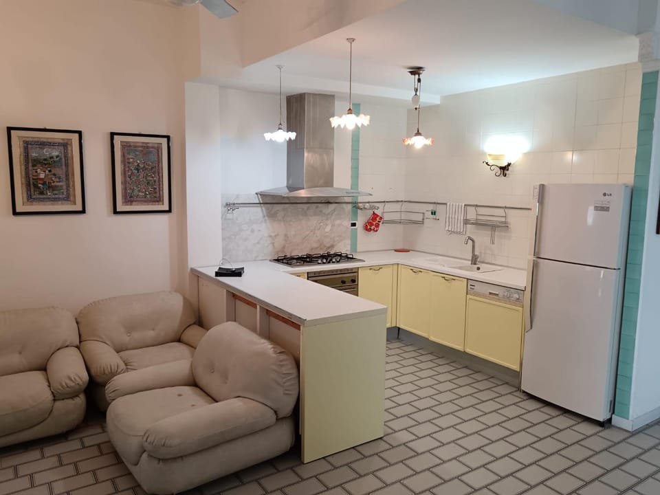Kitchen or kitchenette, Living room, stove