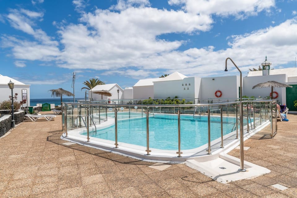 Property building, Living room, Swimming pool