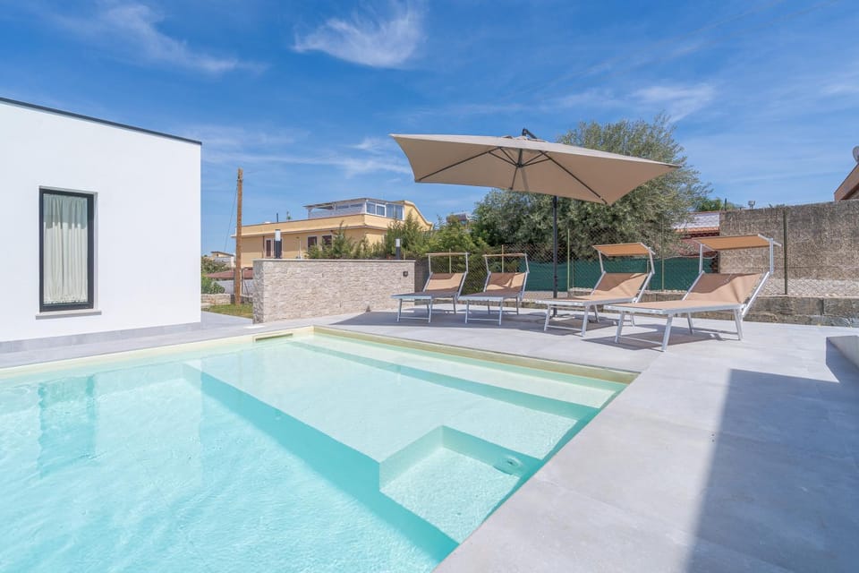 Property building, Living room, Swimming pool