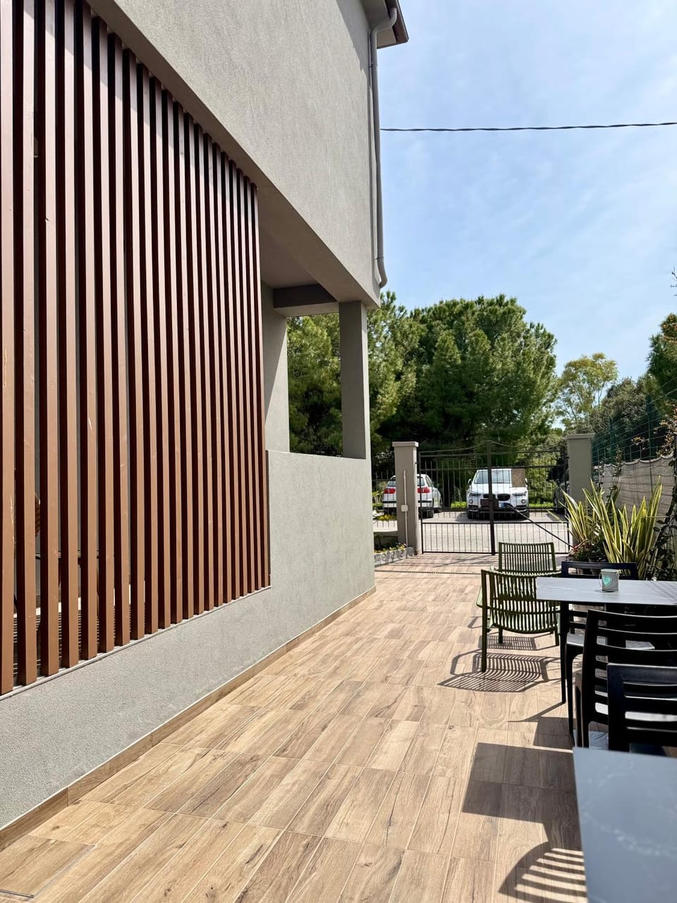 Property building, Patio, Day, Seating area, Parking
