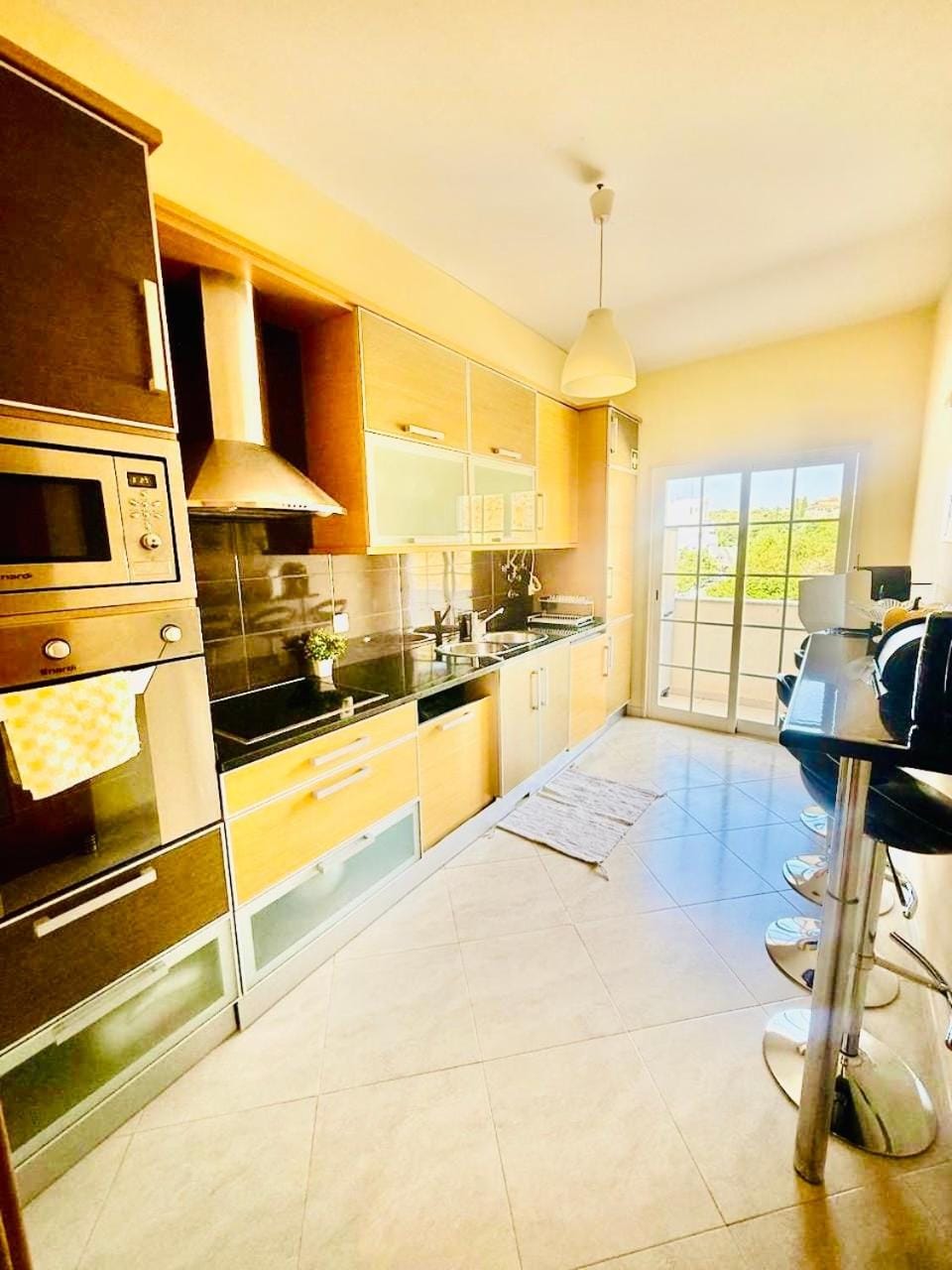 Kitchen or kitchenette, washing machine