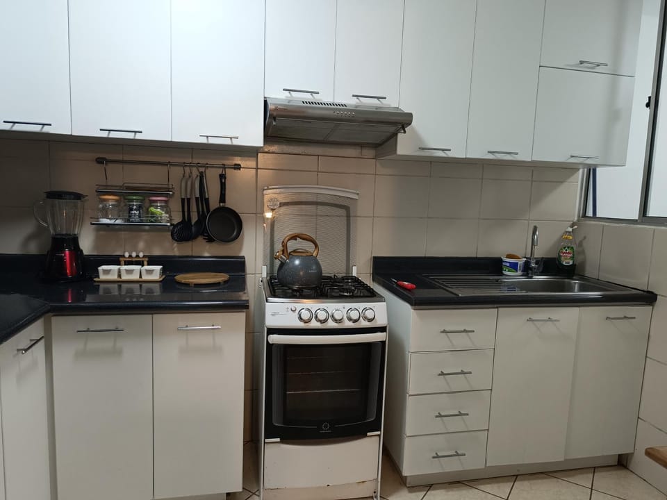 Kitchen or kitchenette, stove
