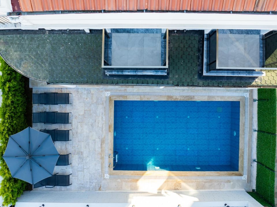 Property building, Patio, Day, Pool view, Swimming pool