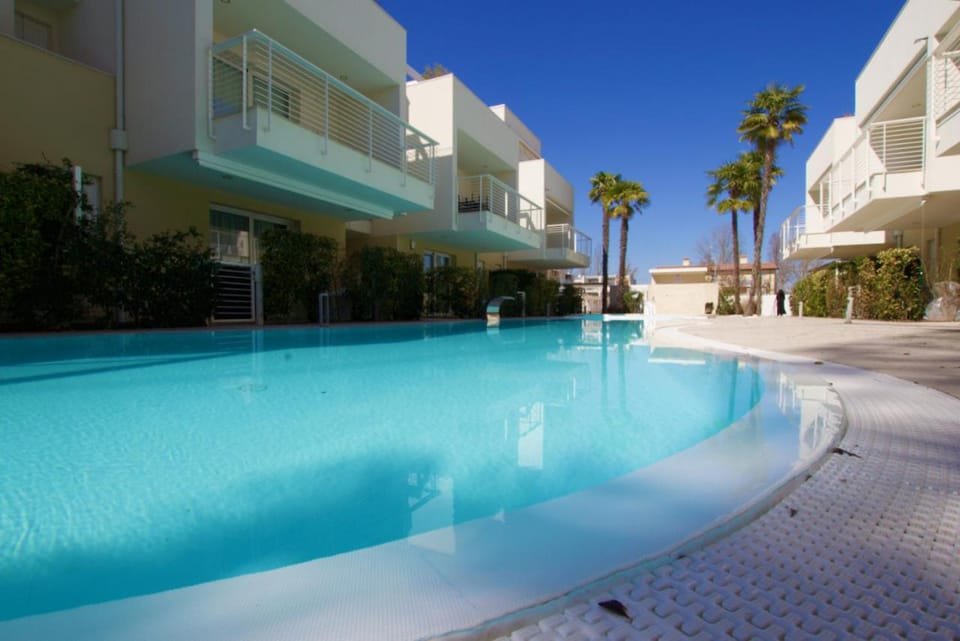 Property building, Pool view, Swimming pool, sunbed