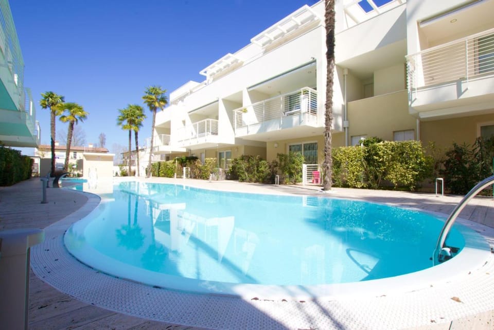 Property building, Pool view, Swimming pool, sunbed