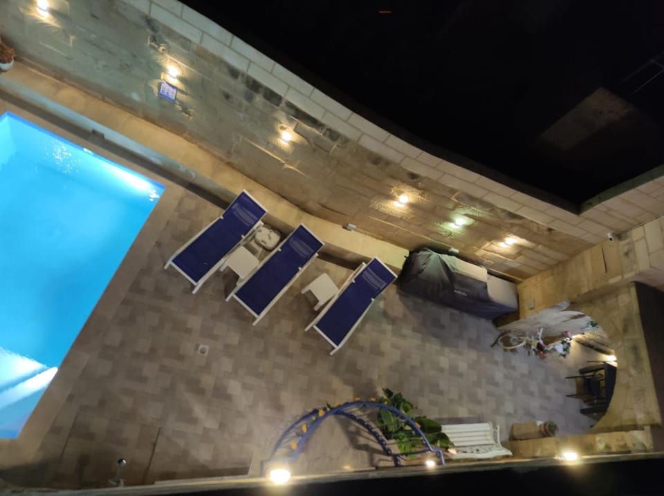 Night, View (from property/room), Pool view, Swimming pool, sunbed