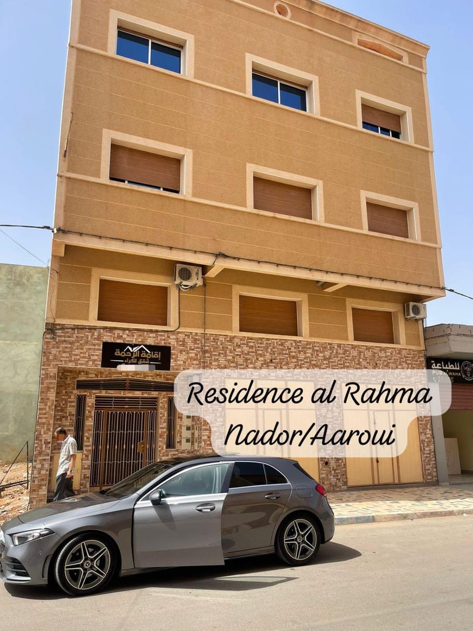 Property building, Facade/entrance, Day, Parking