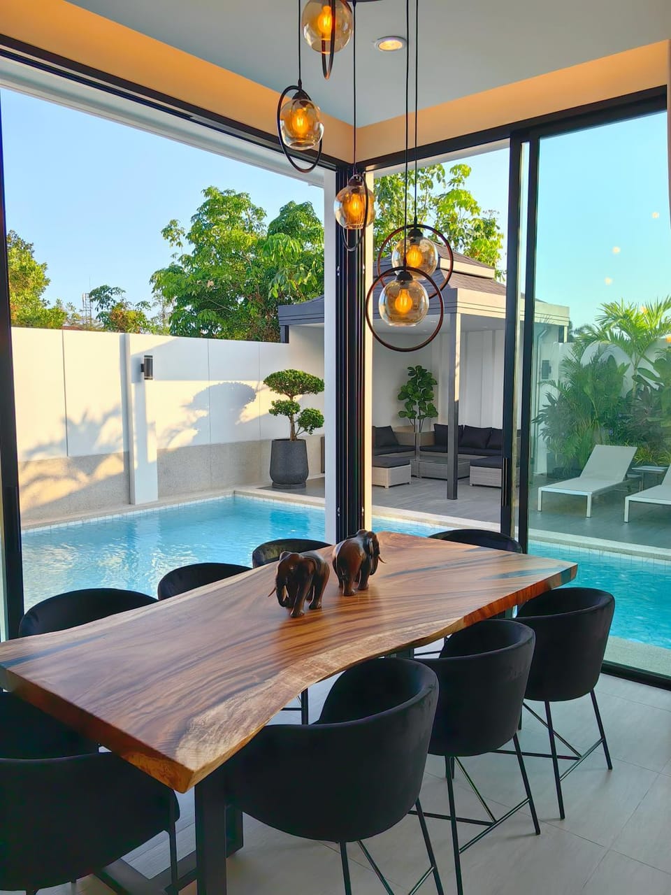 Patio, Seating area, Dining area, Pool view, Swimming pool