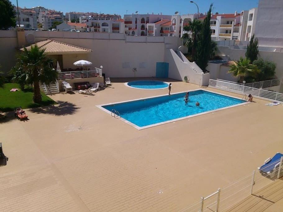 Property building, Pool view, Swimming pool, sunbed