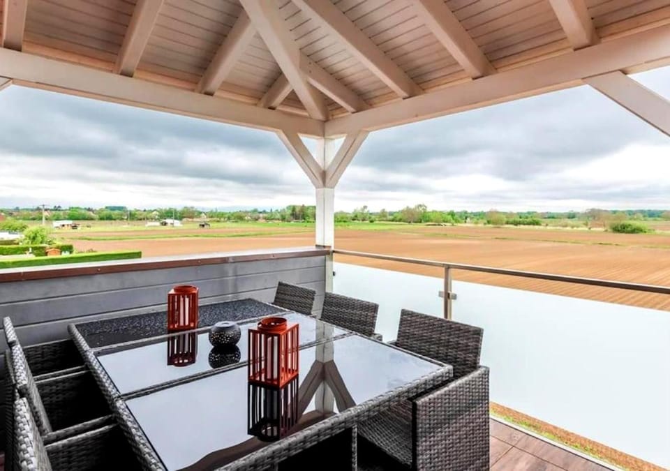 Property building, Patio, Day, View (from property/room), Balcony/Terrace, Dining area, Garden view, Garden view