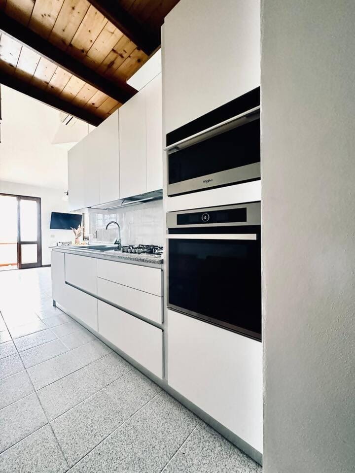 Kitchen or kitchenette, dishwasher, minibar, stove