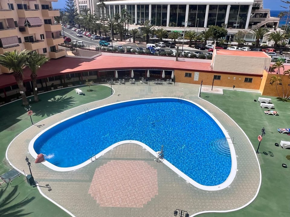 Off site, Day, Solarium, Swimming pool, sunbed