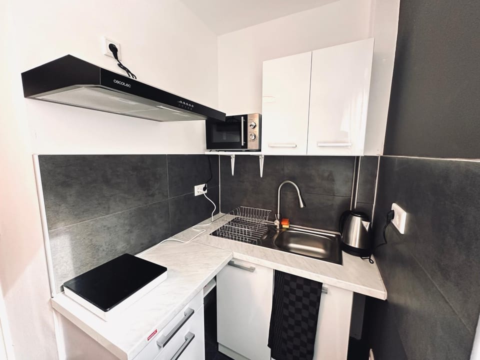 Kitchen or kitchenette, stove